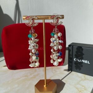NWOT Chanel pearl earrings with pink rhinestones